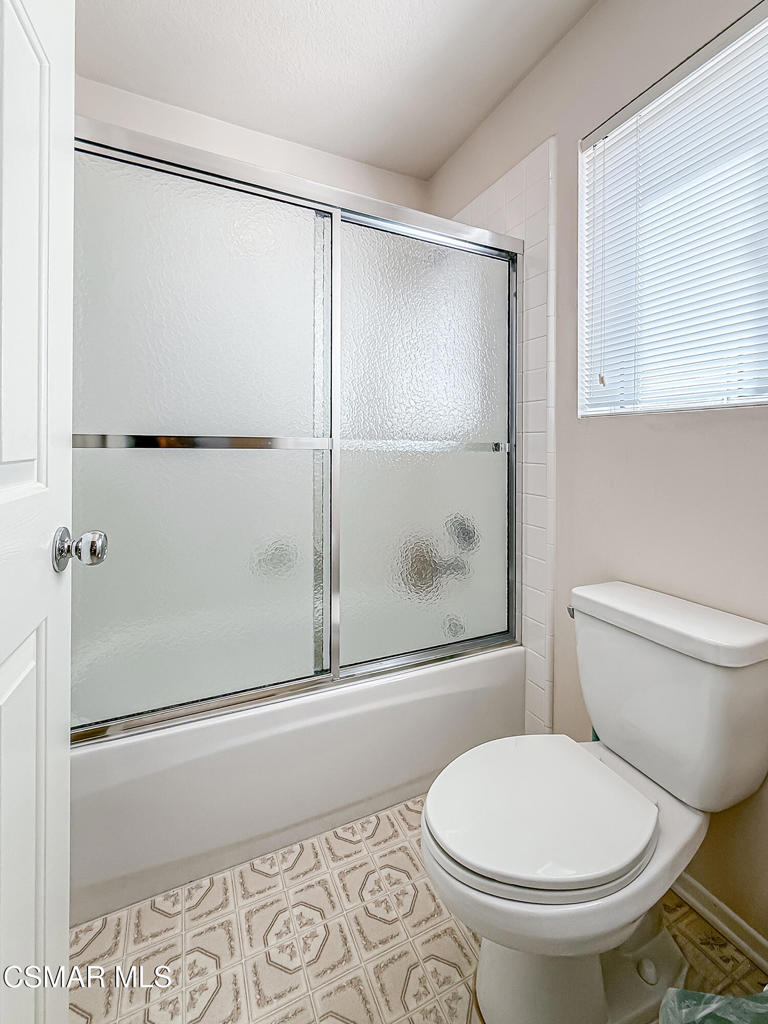260 Sycamore Ridge Street Simi Valley, CA 93065 - Photo 48 of 58 a bathroom with a toilet and a shower