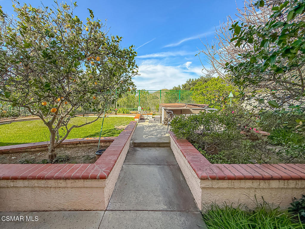 260 Sycamore Ridge Street Simi Valley, CA 93065 - Photo 53 of 58 a view of a pathway with a wrought fence