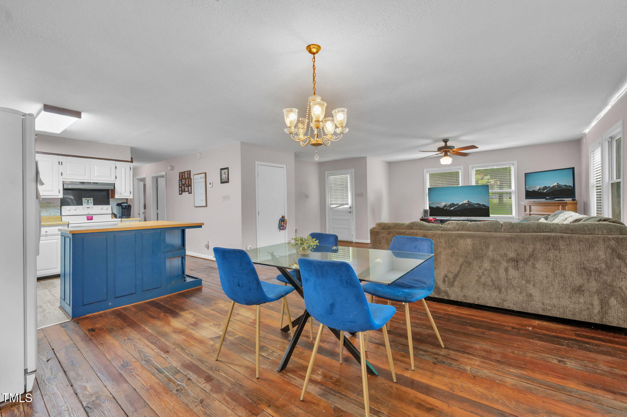 720 Division Street Norlina, NC 27563 - Photo 10 of 38 a view of a dining room with furniture and wooden floor