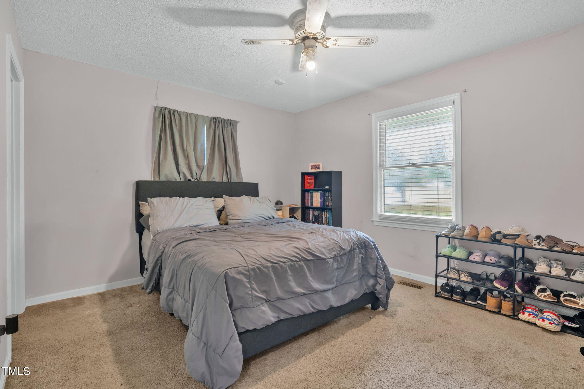 720 Division Street Norlina, NC 27563 - Photo 16 of 38 a bedroom with bed and window