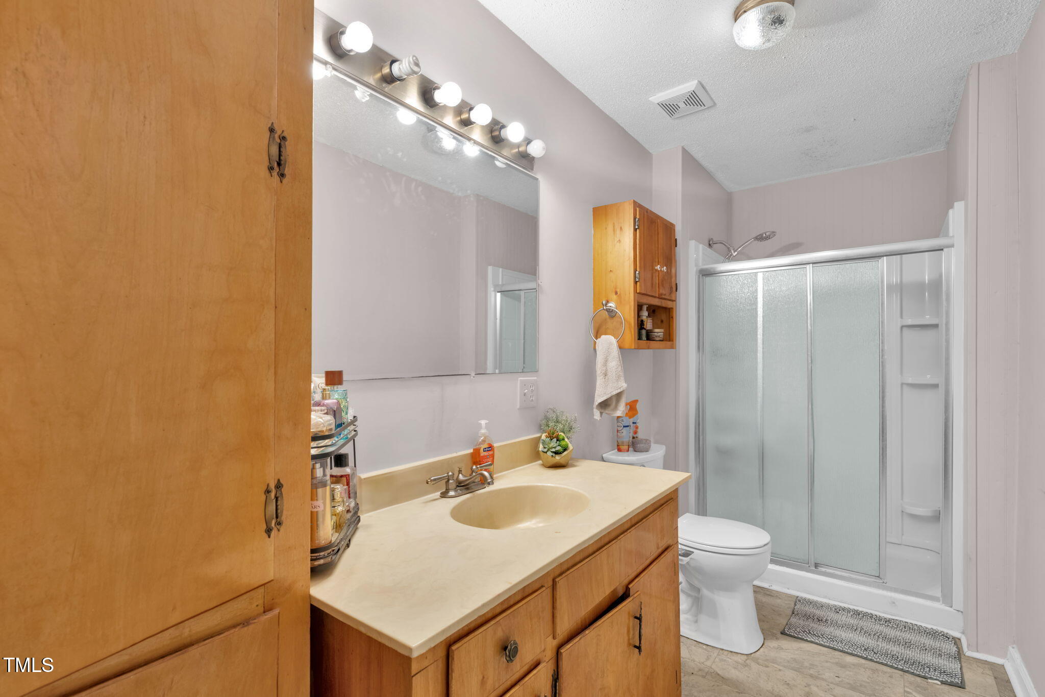 720 Division Street Norlina, NC 27563 - Photo 18 of 38 a bathroom with a sink toilet and shower