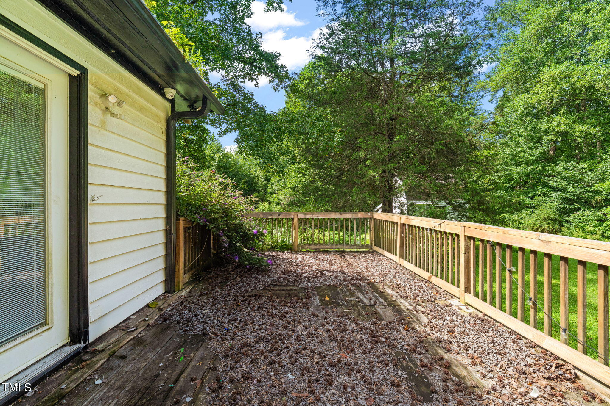 720 Division Street Norlina, NC 27563 - Photo 23 of 38 a view of stairs and trees with wooden fence