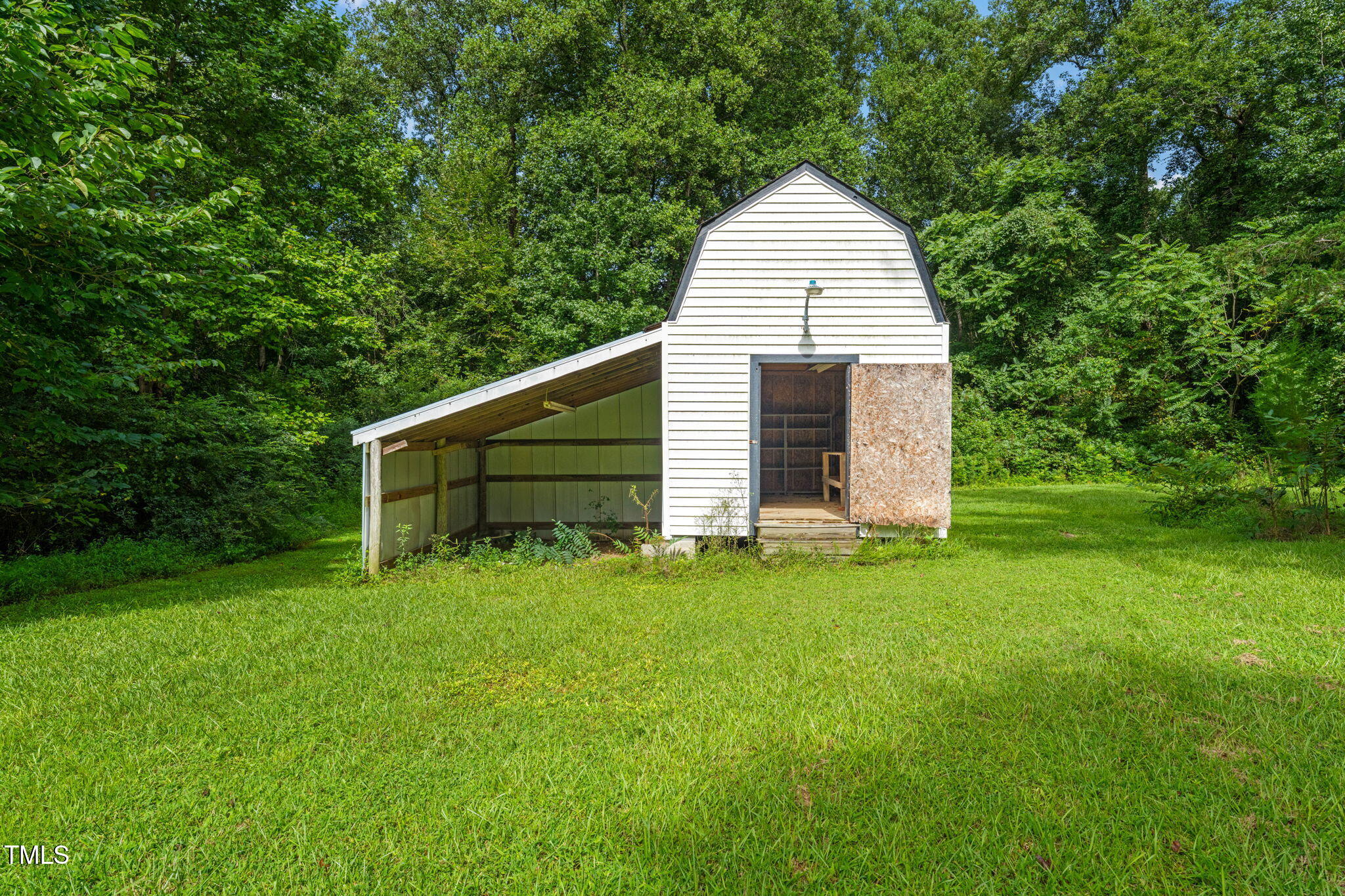 720 Division Street Norlina, NC 27563 - Photo 31 of 38 a view of a house with backyard