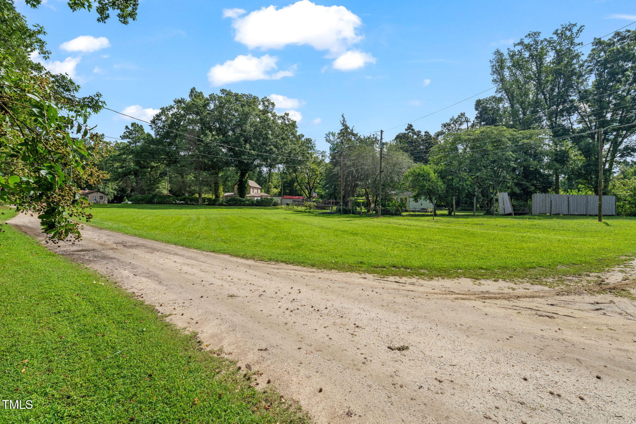 720 Division Street Norlina, NC 27563 - Photo 34 of 38 a view of a golf course with a lake