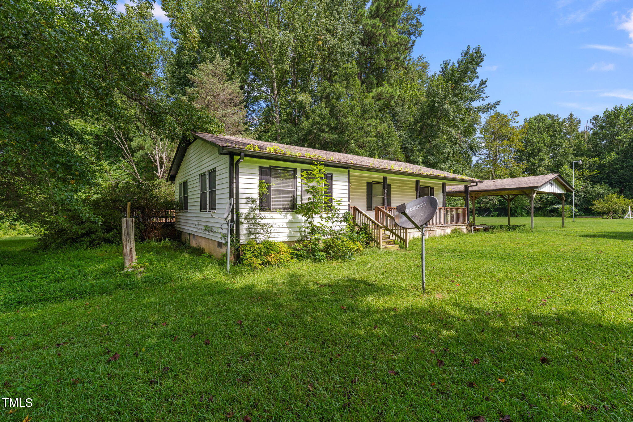 720 Division Street Norlina, NC 27563 - Photo 36 of 38 a view of a house with a backyard