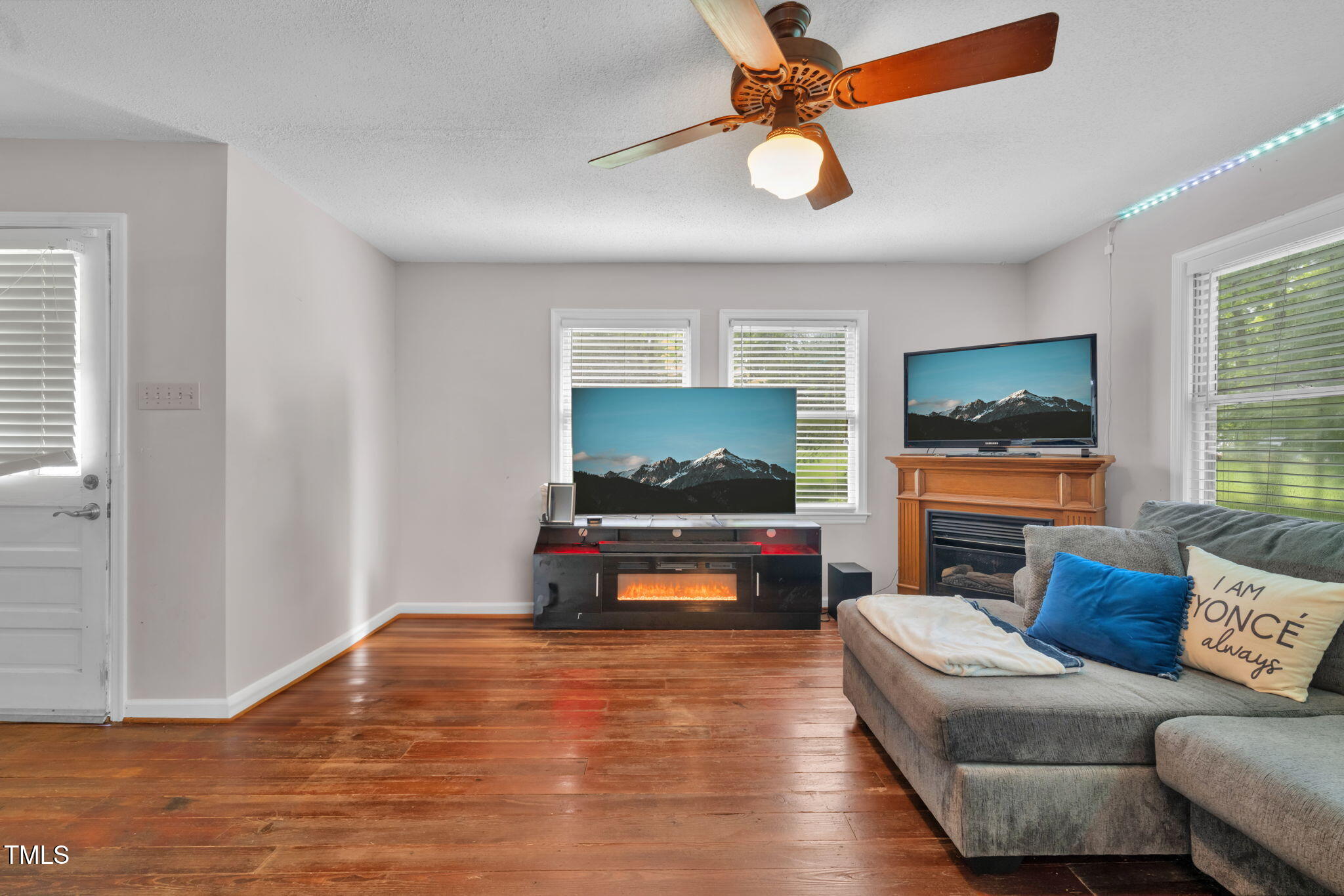 720 Division Street Norlina, NC 27563 - Photo 4 of 38 a living room with furniture and a flat screen tv