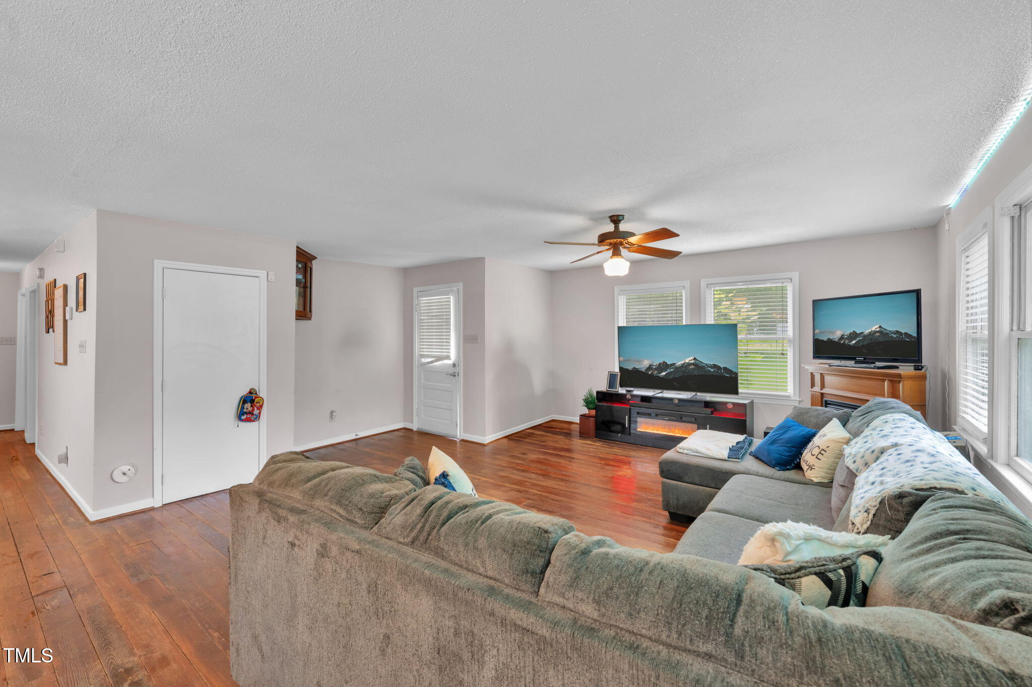 720 Division Street Norlina, NC 27563 - Photo 8 of 38 a living room with furniture and a flat screen tv