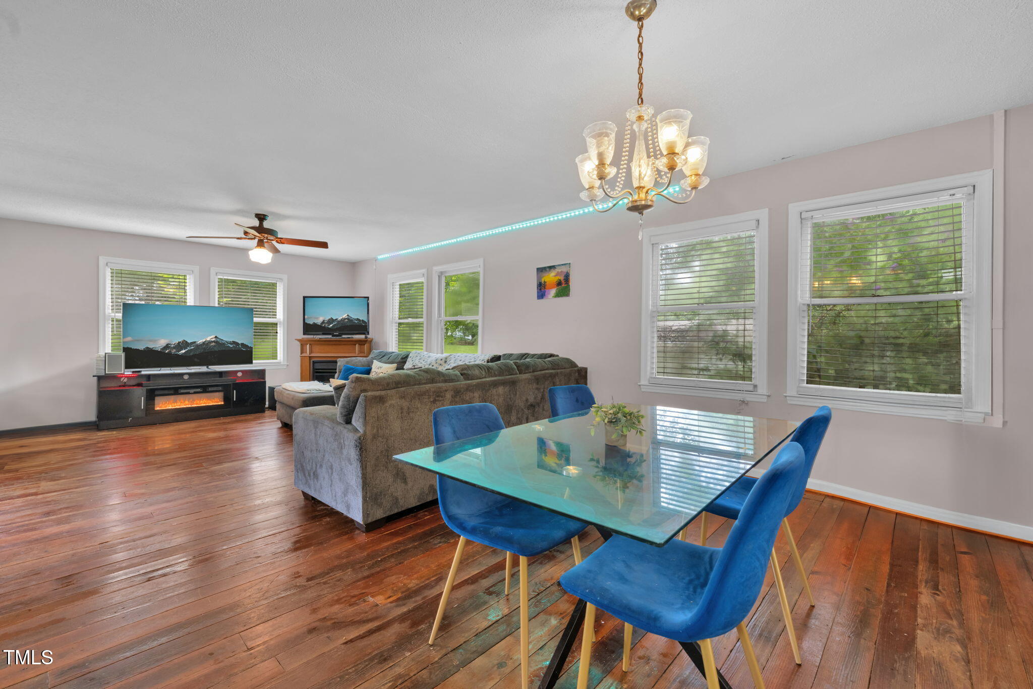 720 Division Street Norlina, NC 27563 - Photo 9 of 38 a view of a dining room with furniture window and wooden floor