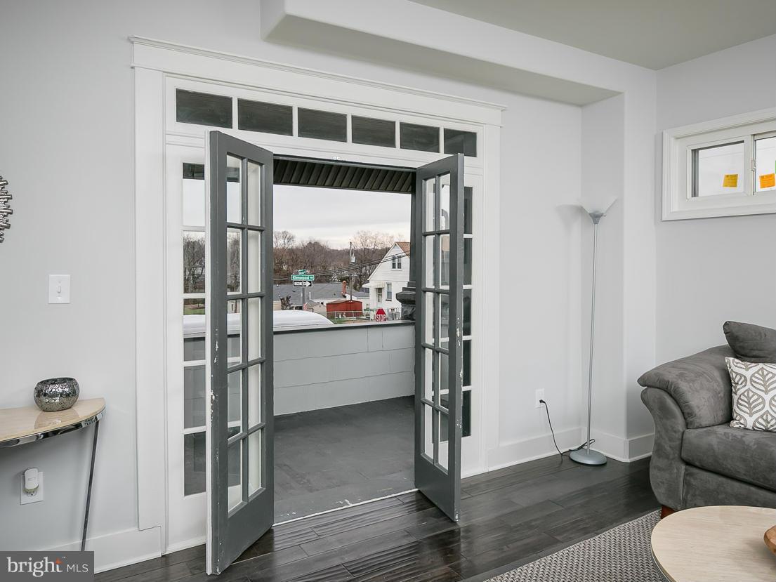 600 Elmwood Road Baltimore, MD 21206 - Photo 8 of 30 Living Room w/French Doors to deck