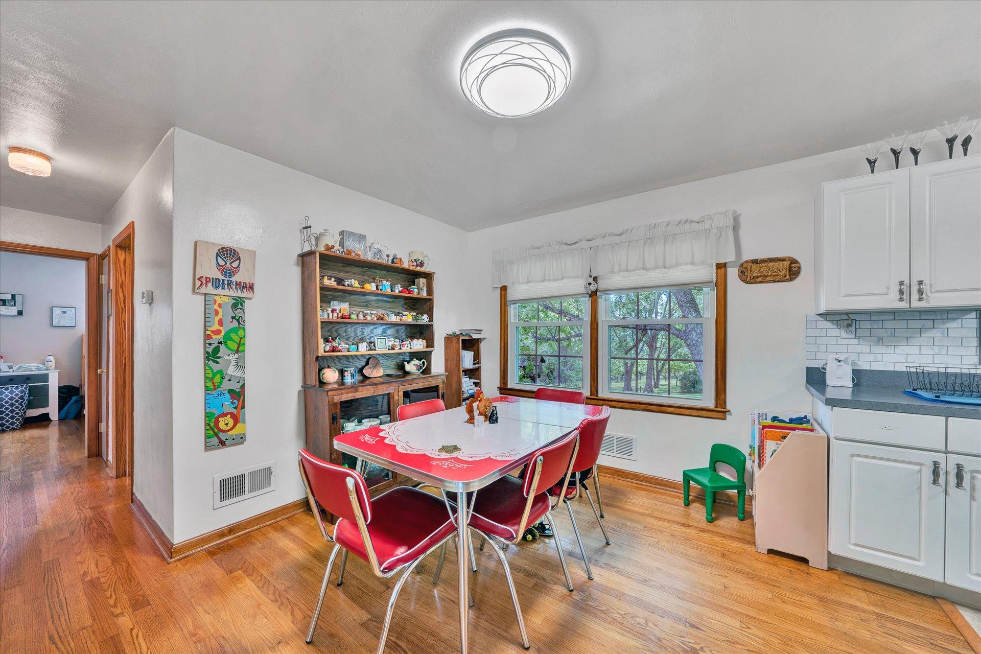 2407 White House Road Moneta, VA 24121 - Photo 11 of 52 a view of a dining room with furniture window and wooden floor