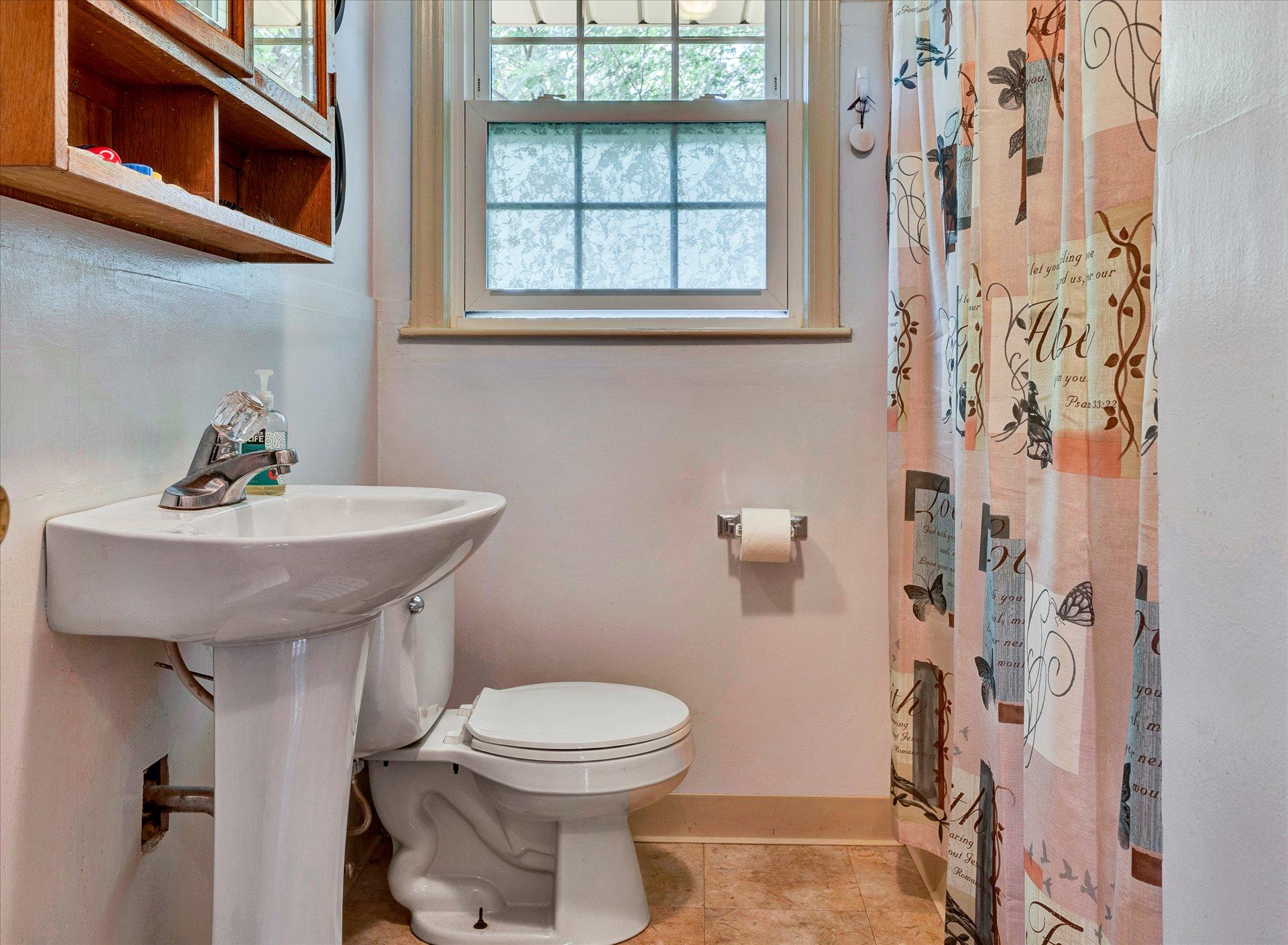2407 White House Road Moneta, VA 24121 - Photo 16 of 52 a bathroom with a sink toilet and shower