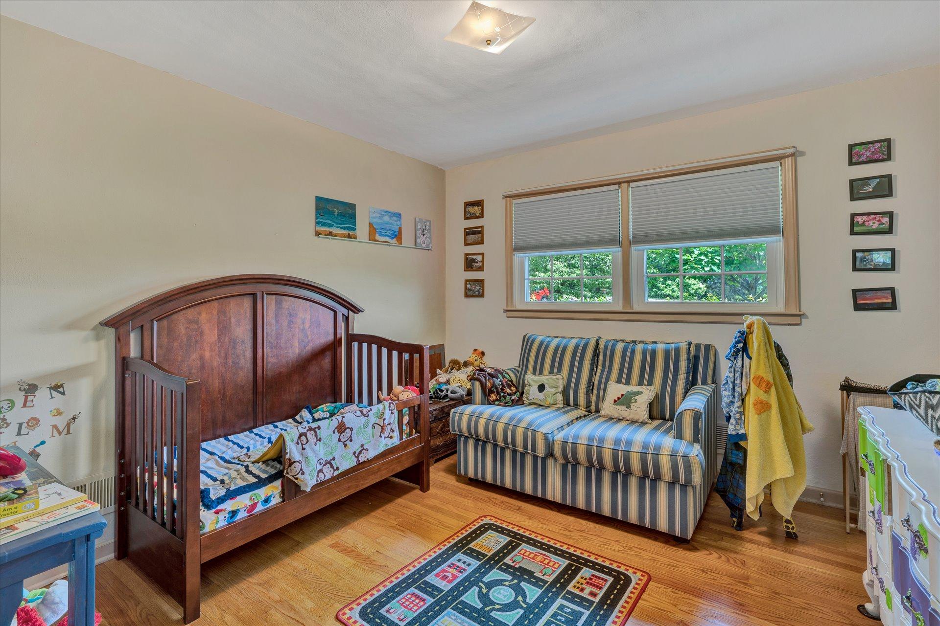 2407 White House Road Moneta, VA 24121 - Photo 19 of 52 a bedroom with a bed and a window
