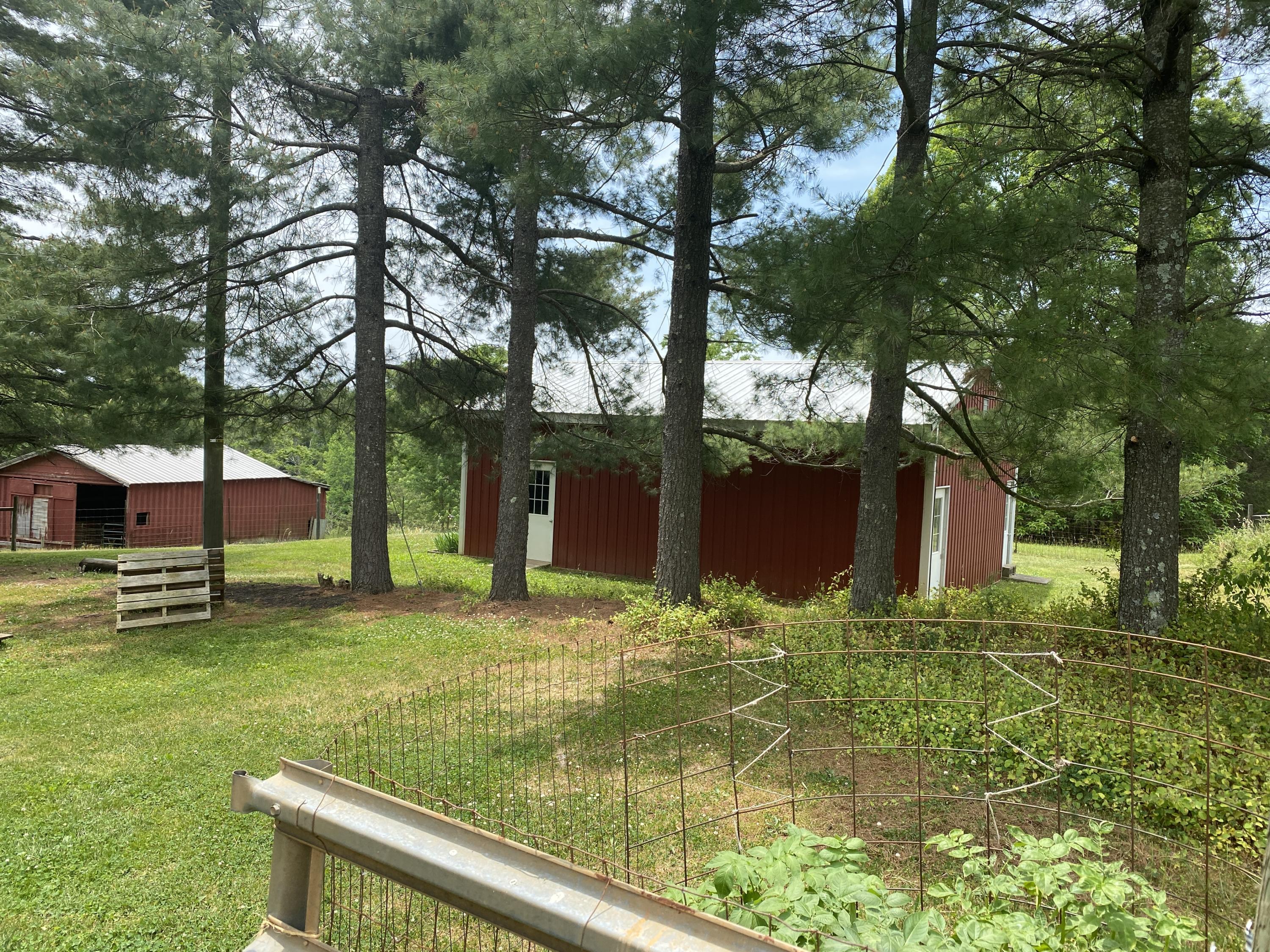 2407 White House Road Moneta, VA 24121 - Photo 46 of 52 a view of a garden with a bench