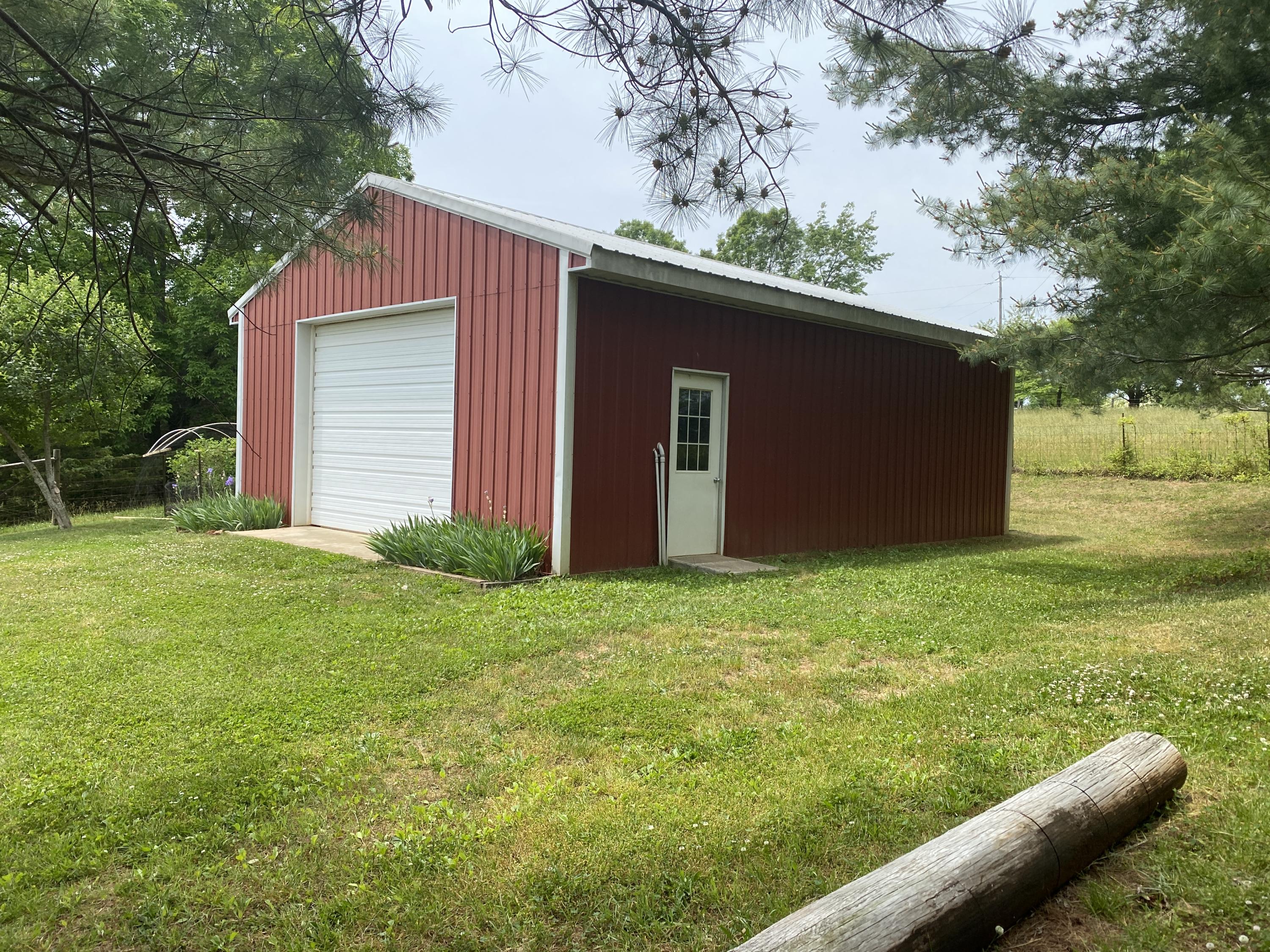 2407 White House Road Moneta, VA 24121 - Photo 52 of 52 a backyard of a house with lots of green space