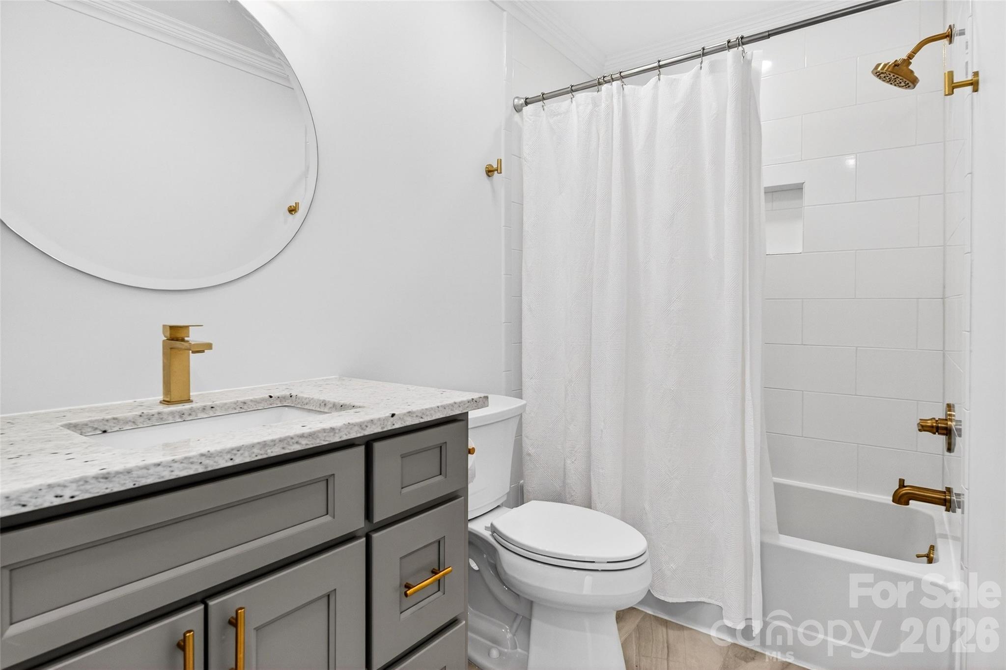 18521 Vineyard Point Lane Cornelius, NC 28031 - Photo 20 of 27 a bathroom with a granite countertop sink toilet and shower