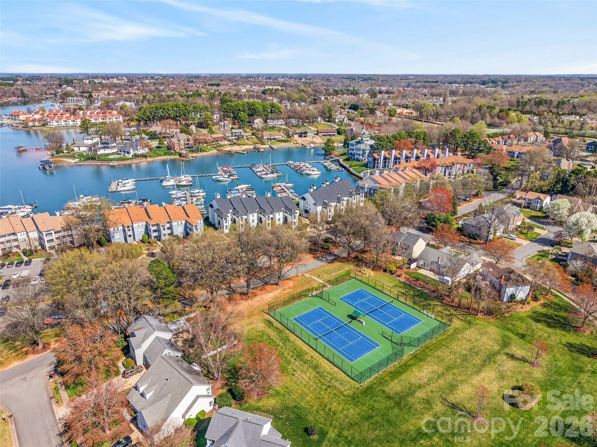 18521 Vineyard Point Lane Cornelius, NC 28031 - Photo 25 of 27 an aerial view of residential houses with outdoor space and swimming pool