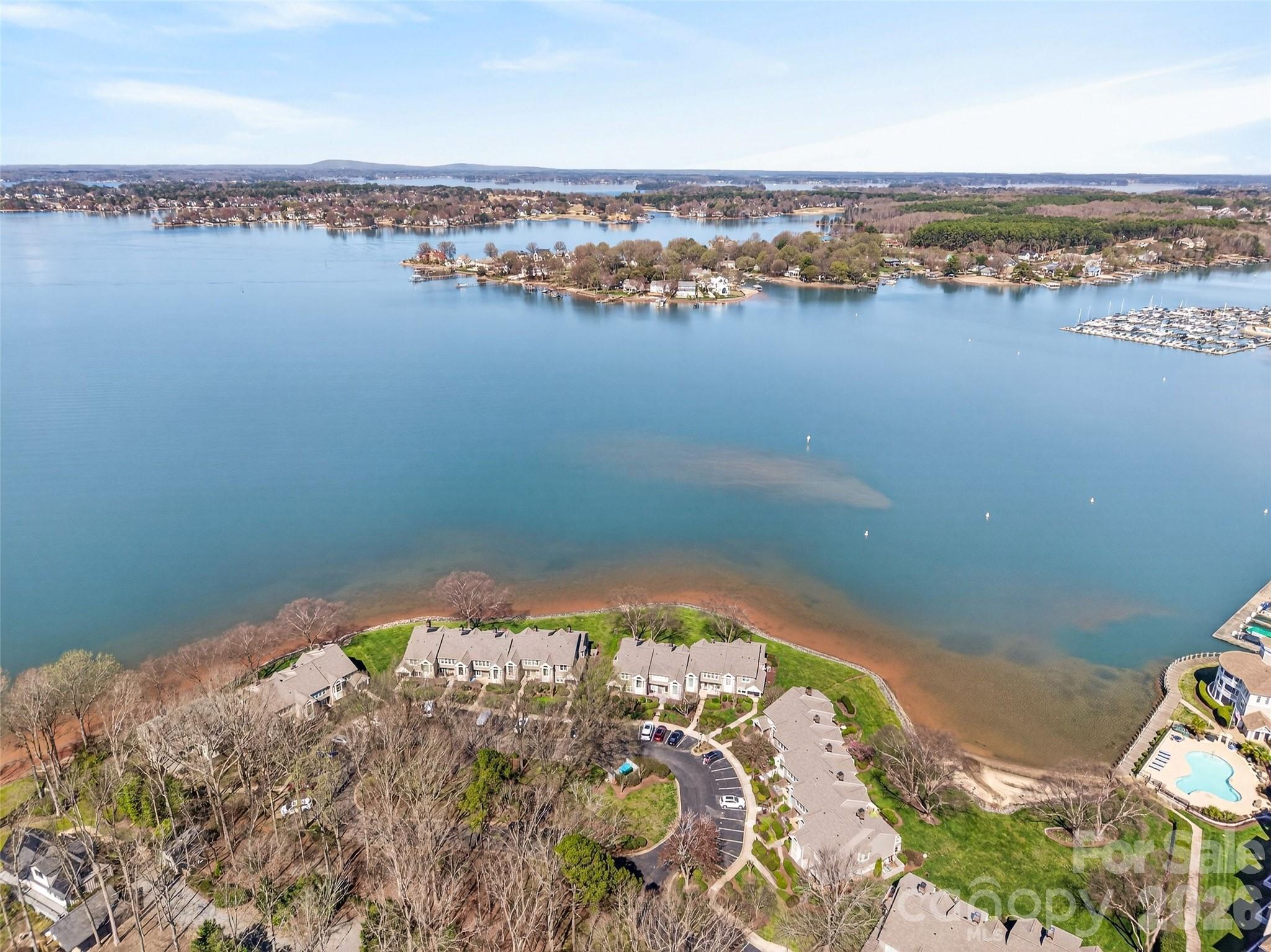 18521 Vineyard Point Lane Cornelius, NC 28031 - Photo 26 of 27 an aerial view of a house with a lake view