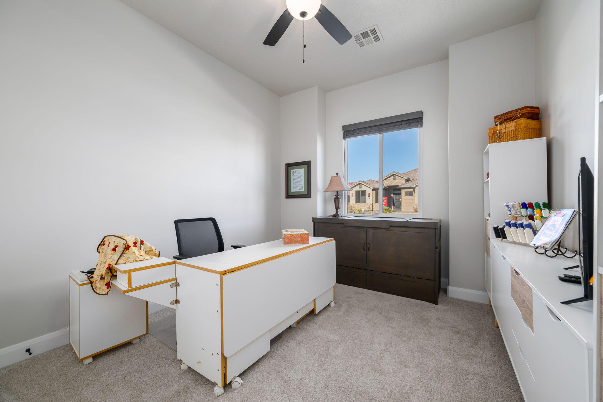 227 United Way Ivins, UT 84738 - Photo 20 of 28 Versatile space ideal for a home office, guest room, or hobby area.