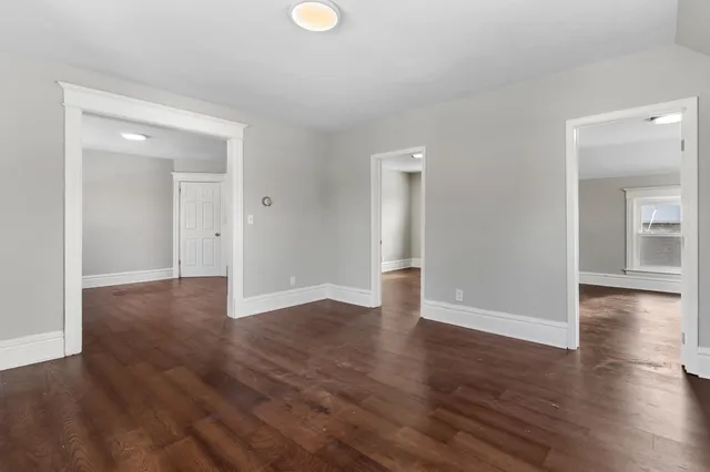 a view of a livingroom with wooden floor