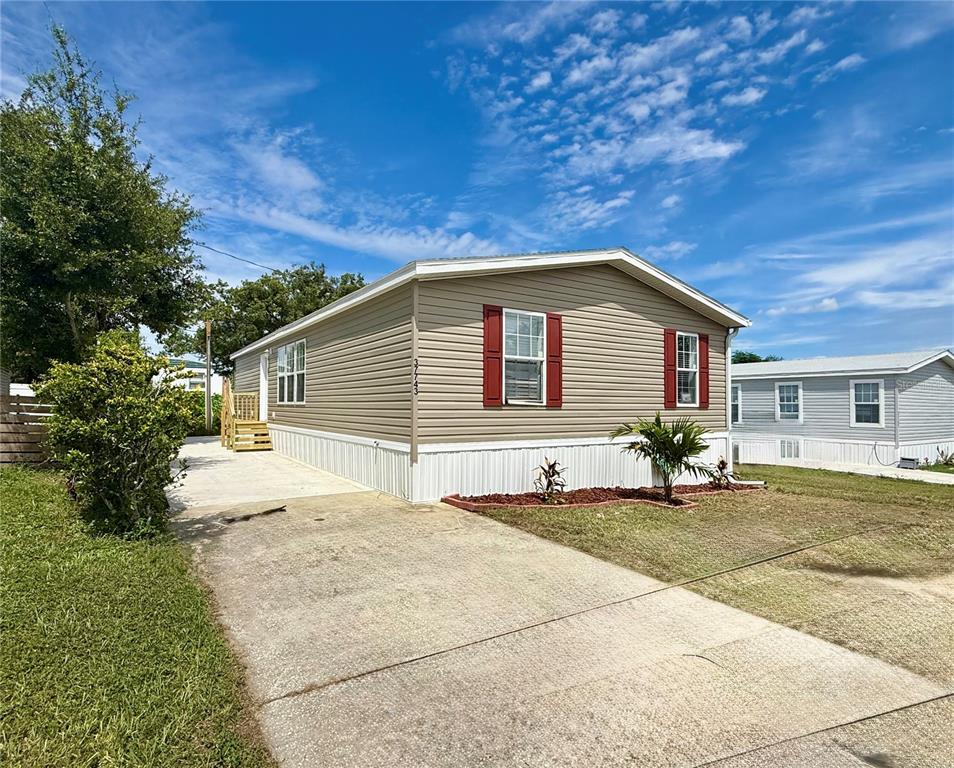 37743 Geiger Road Zephyrhills, FL 33542 - Photo 21 of 21 a front view of a house with a yard