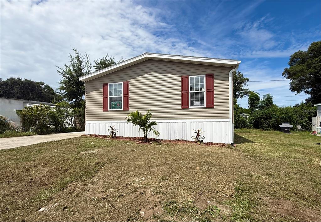 37743 Geiger Road Zephyrhills, FL 33542 - Photo 3 of 21 a house with trees in the background