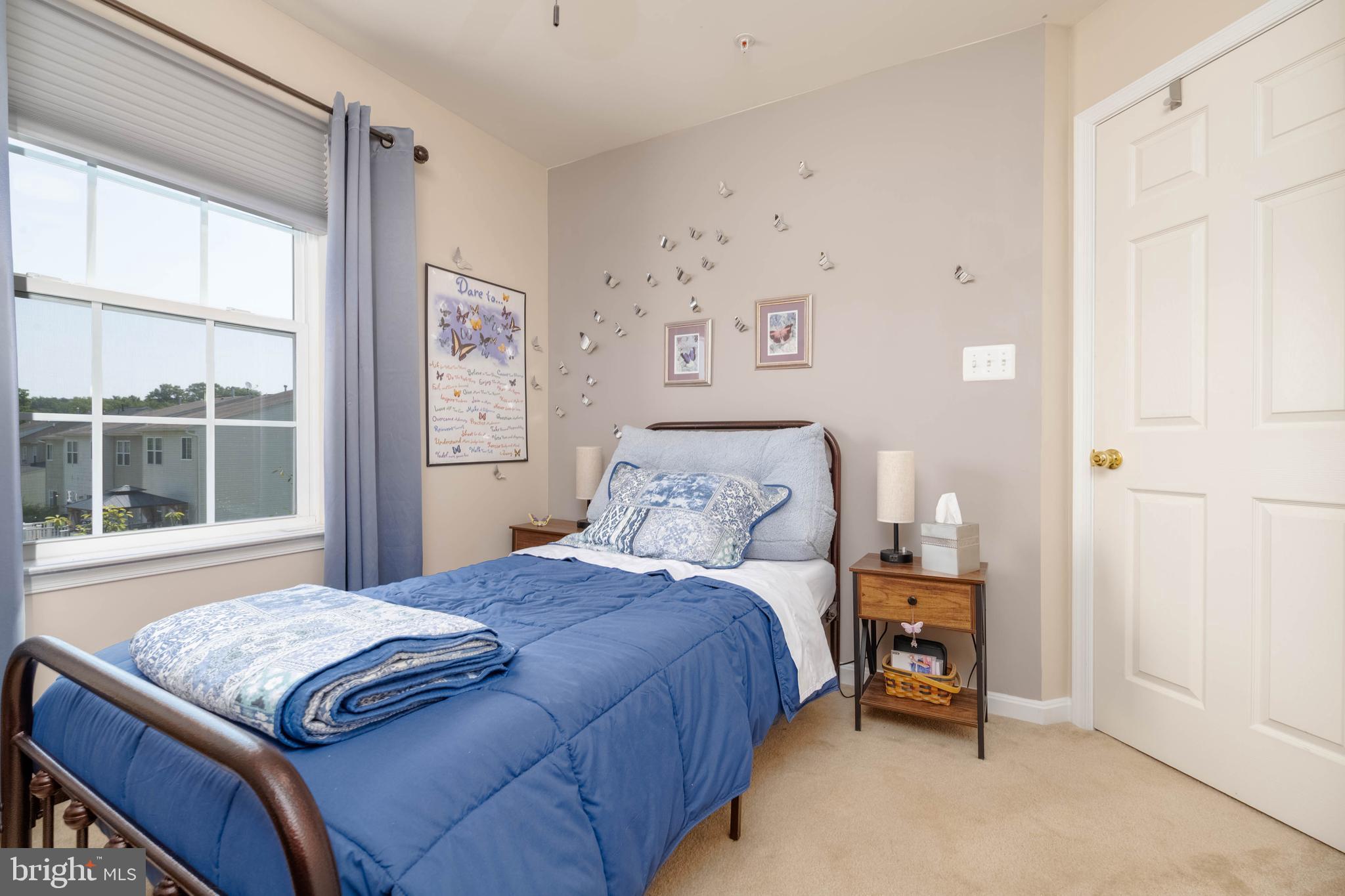 3107 Raking Leaf Drive Abingdon, MD 21009 - Photo 14 of 39 a bedroom with a bed and a window