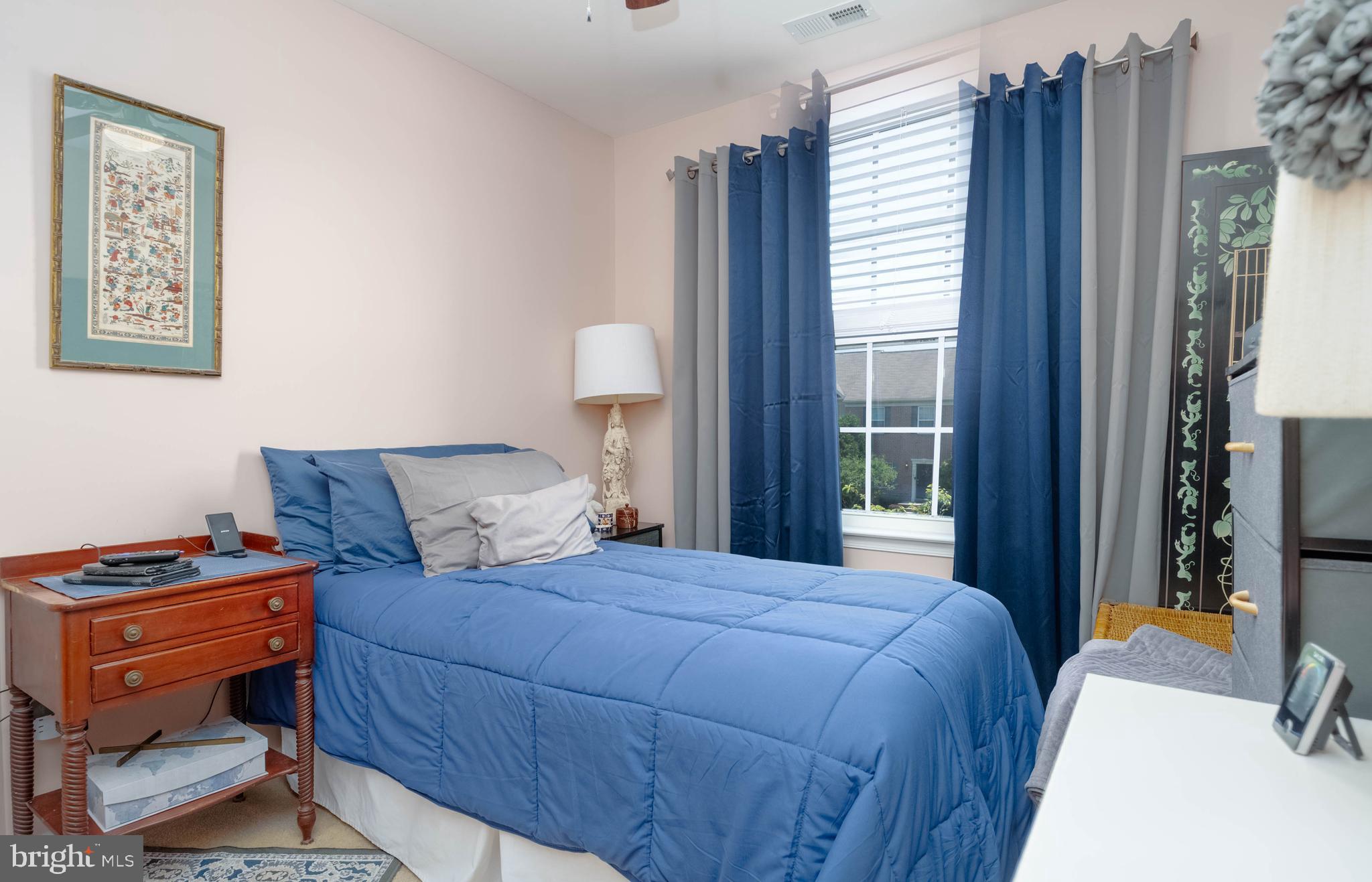 3107 Raking Leaf Drive Abingdon, MD 21009 - Photo 15 of 39 a bedroom with a bed and a window