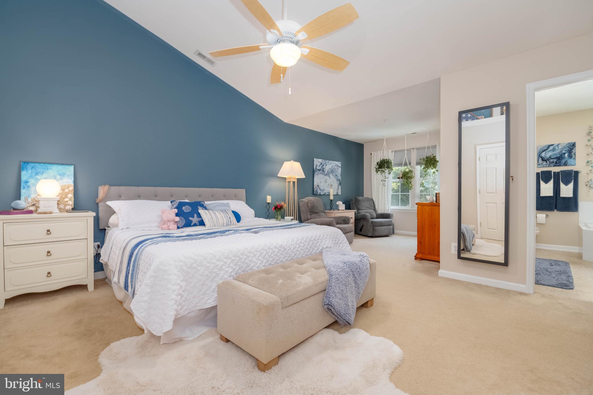 3107 Raking Leaf Drive Abingdon, MD 21009 - Photo 17 of 39 a spacious bedroom with a bed and a chandelier