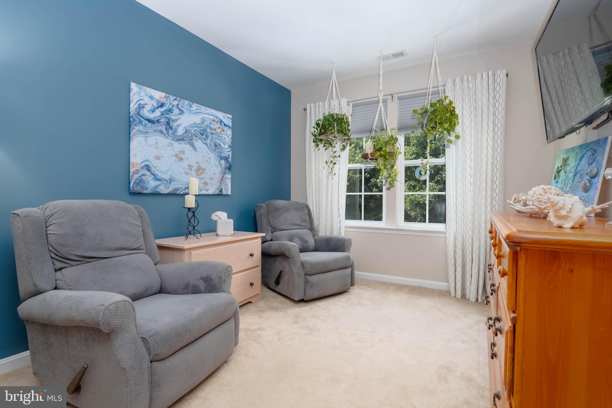 3107 Raking Leaf Drive Abingdon, MD 21009 - Photo 18 of 39 a living room with furniture and a large window