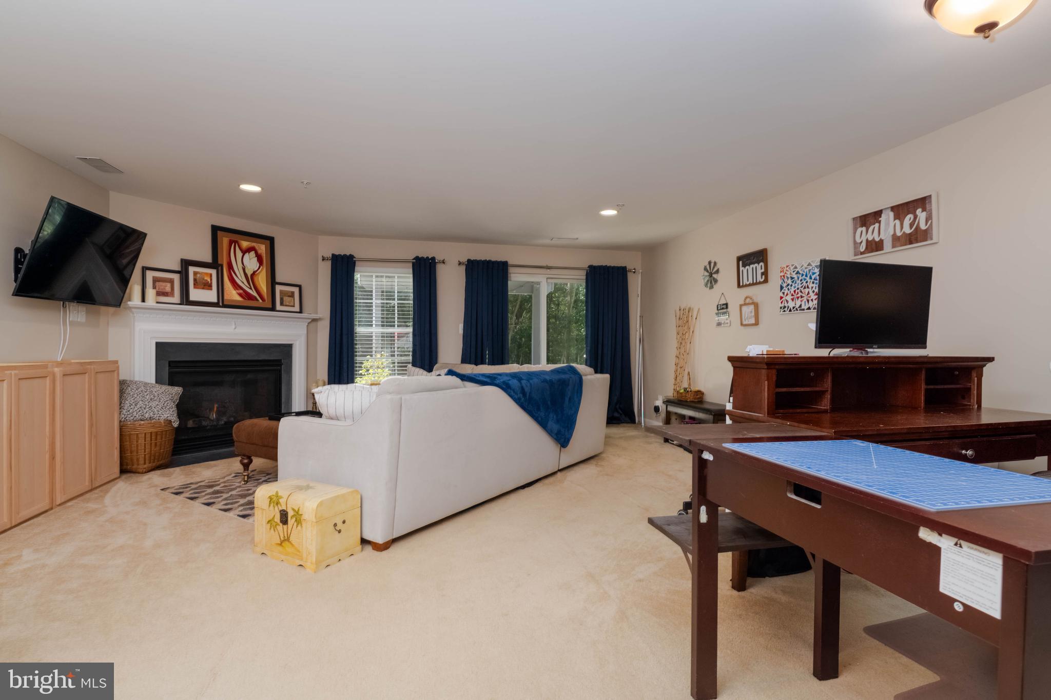 3107 Raking Leaf Drive Abingdon, MD 21009 - Photo 25 of 39 a bed room with furniture and a fireplace