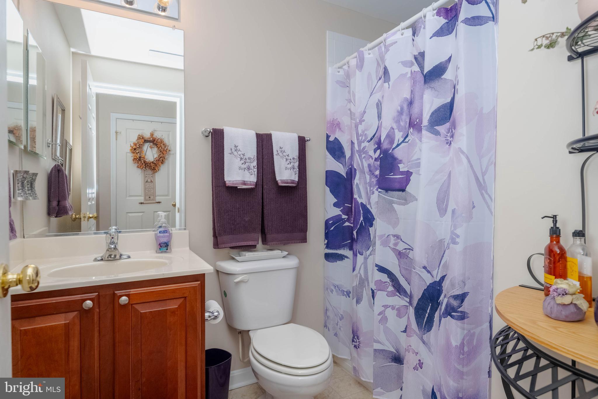 3107 Raking Leaf Drive Abingdon, MD 21009 - Photo 26 of 39 a bathroom with a sink vanity mirror and toilet