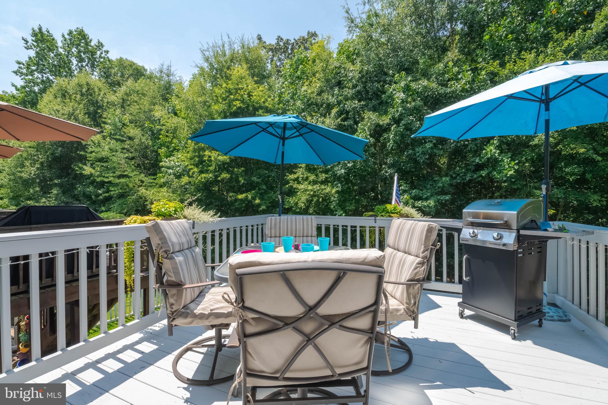 3107 Raking Leaf Drive Abingdon, MD 21009 - Photo 36 of 39 a view of balcony with wooden floor and umbrella