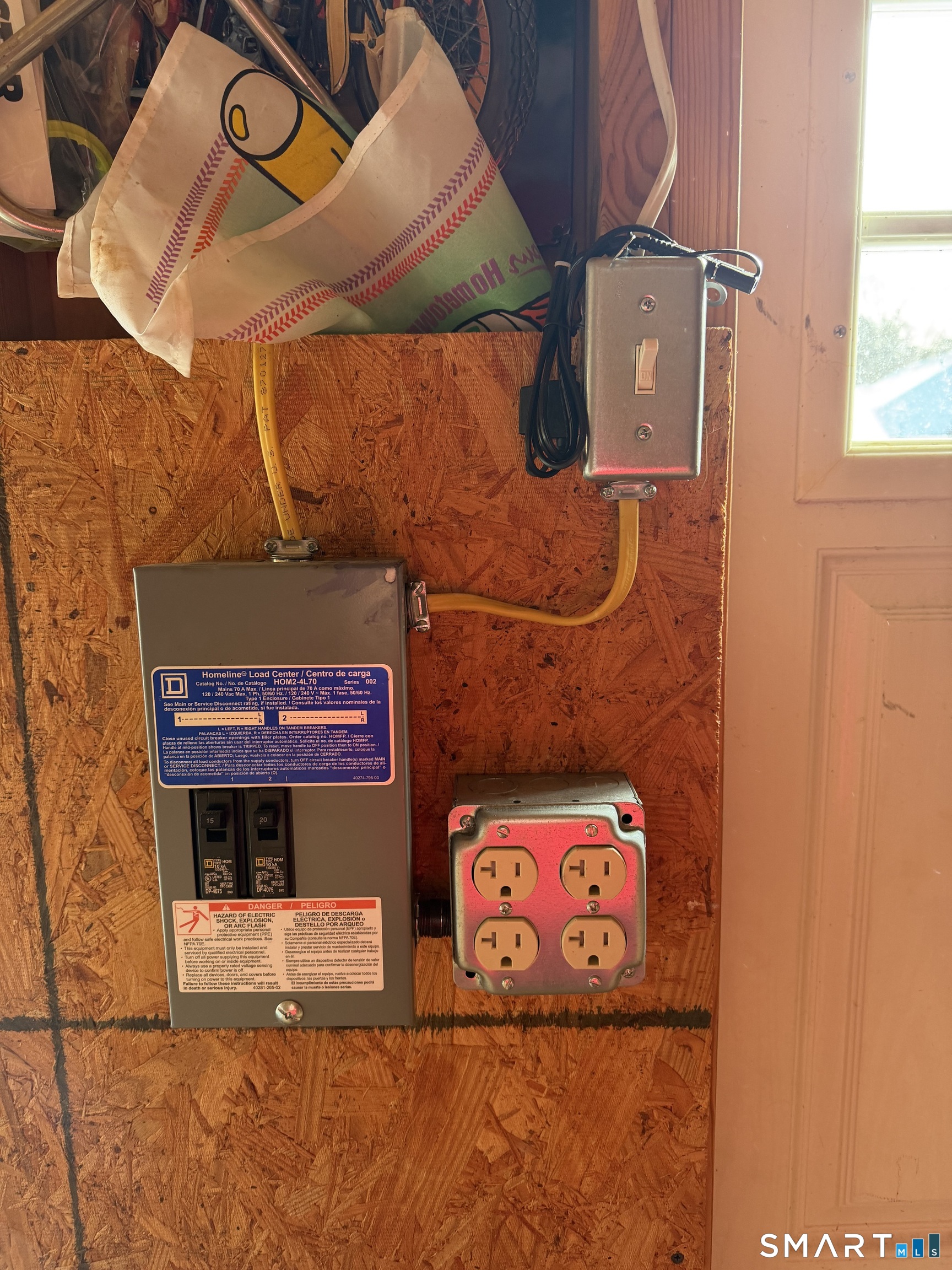 292 Old Colchester Road Montville, CT 06382 - Photo 9 of 18 a street sign on a wall next to a window