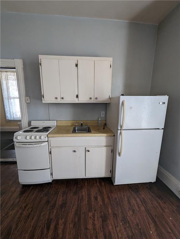 300 Jackson Street Rochester, PA 15074 - Photo 6 of 10 a kitchen with cabinets appliances