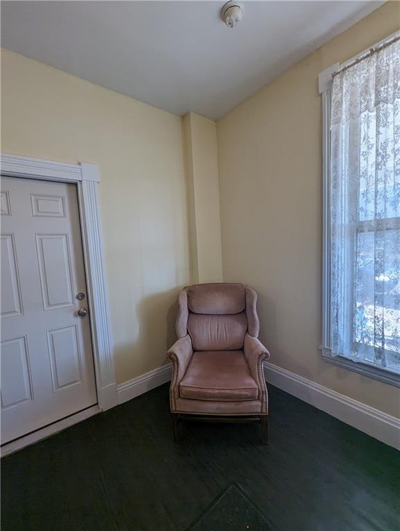 300 Jackson Street Rochester, PA 15074 - Photo 8 of 10 a wooden bench sitting in a room