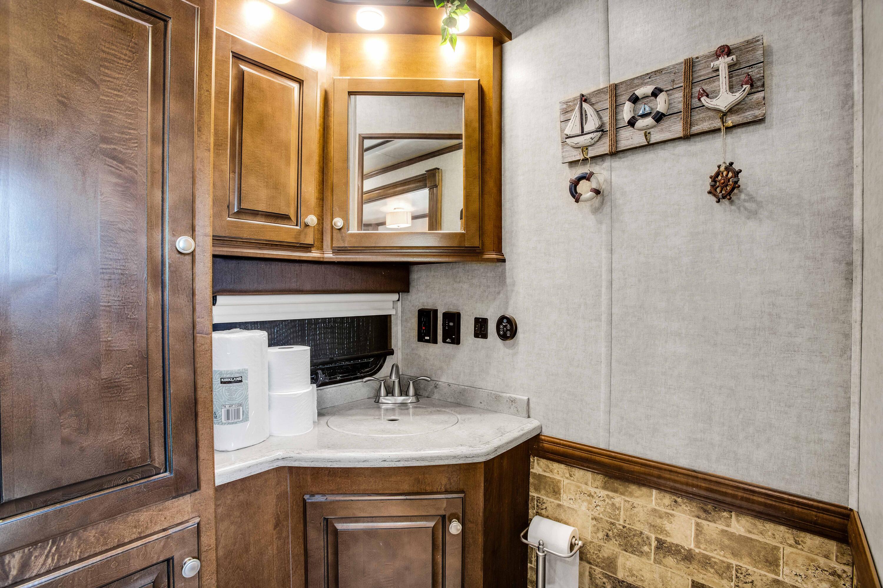 69411 Ramon Road, Unit 131 Cathedral City, CA 92234 - Photo 16 of 65 a bathroom with a sink and a mirror