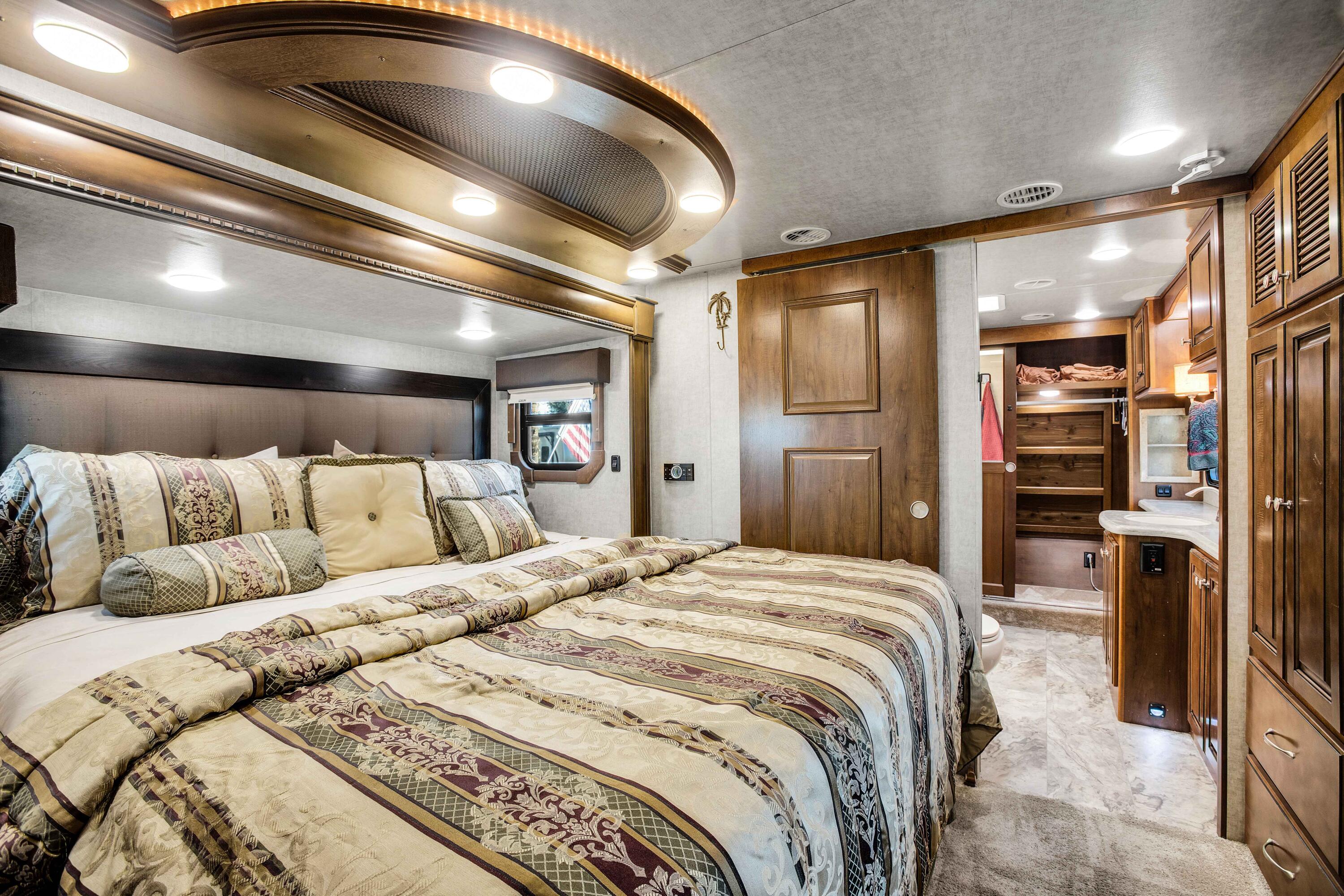 69411 Ramon Road, Unit 131 Cathedral City, CA 92234 - Photo 17 of 65 a large bedroom with a bed and a television