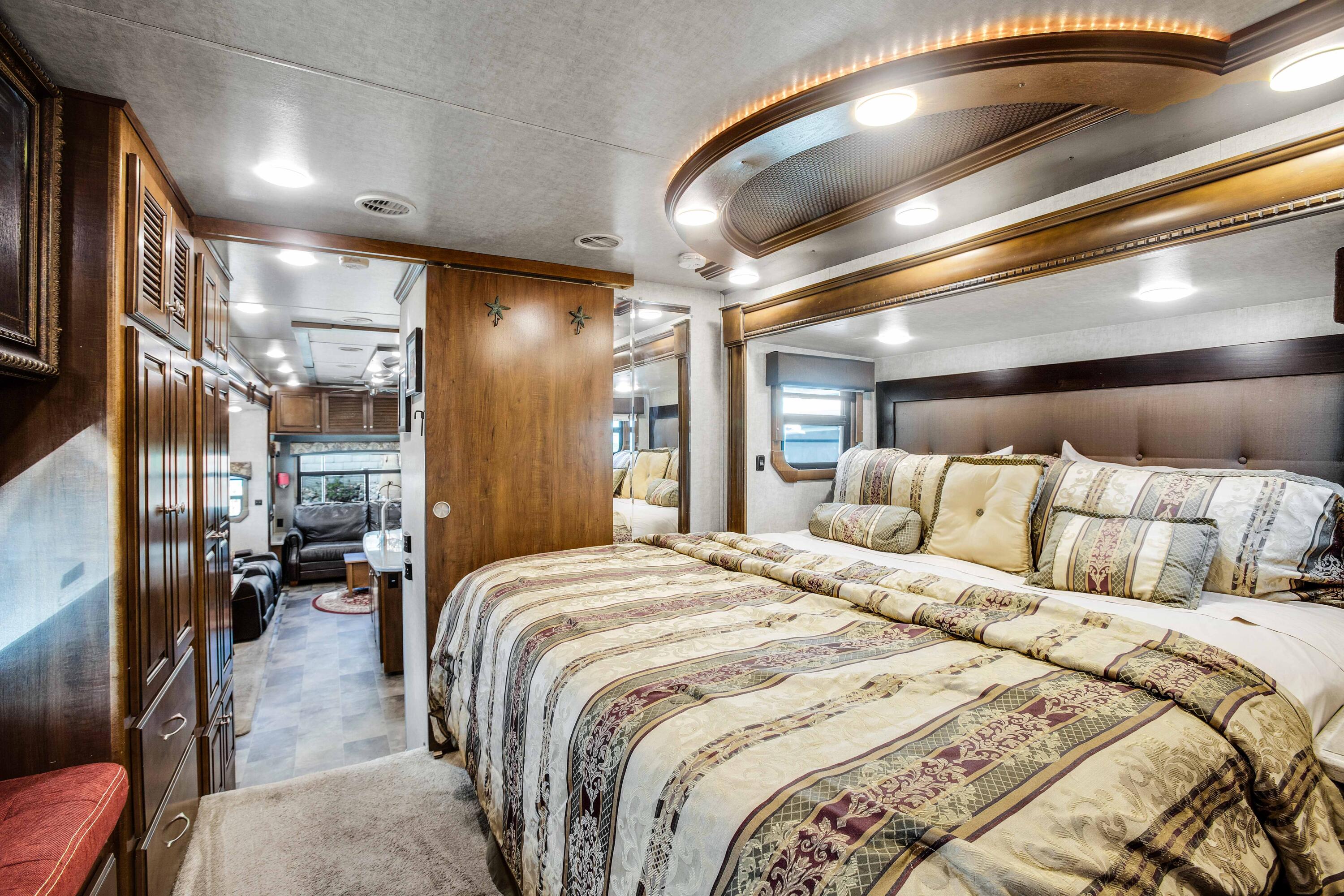 69411 Ramon Road, Unit 131 Cathedral City, CA 92234 - Photo 18 of 65 a bed room with a bed and cabinets