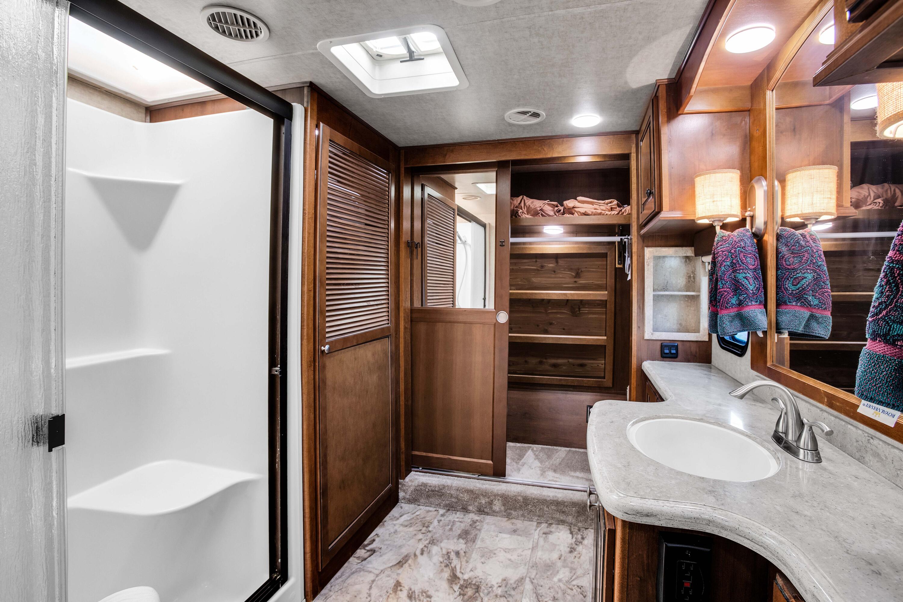 69411 Ramon Road, Unit 131 Cathedral City, CA 92234 - Photo 19 of 65 a bathroom with a sink a toilet and a shower