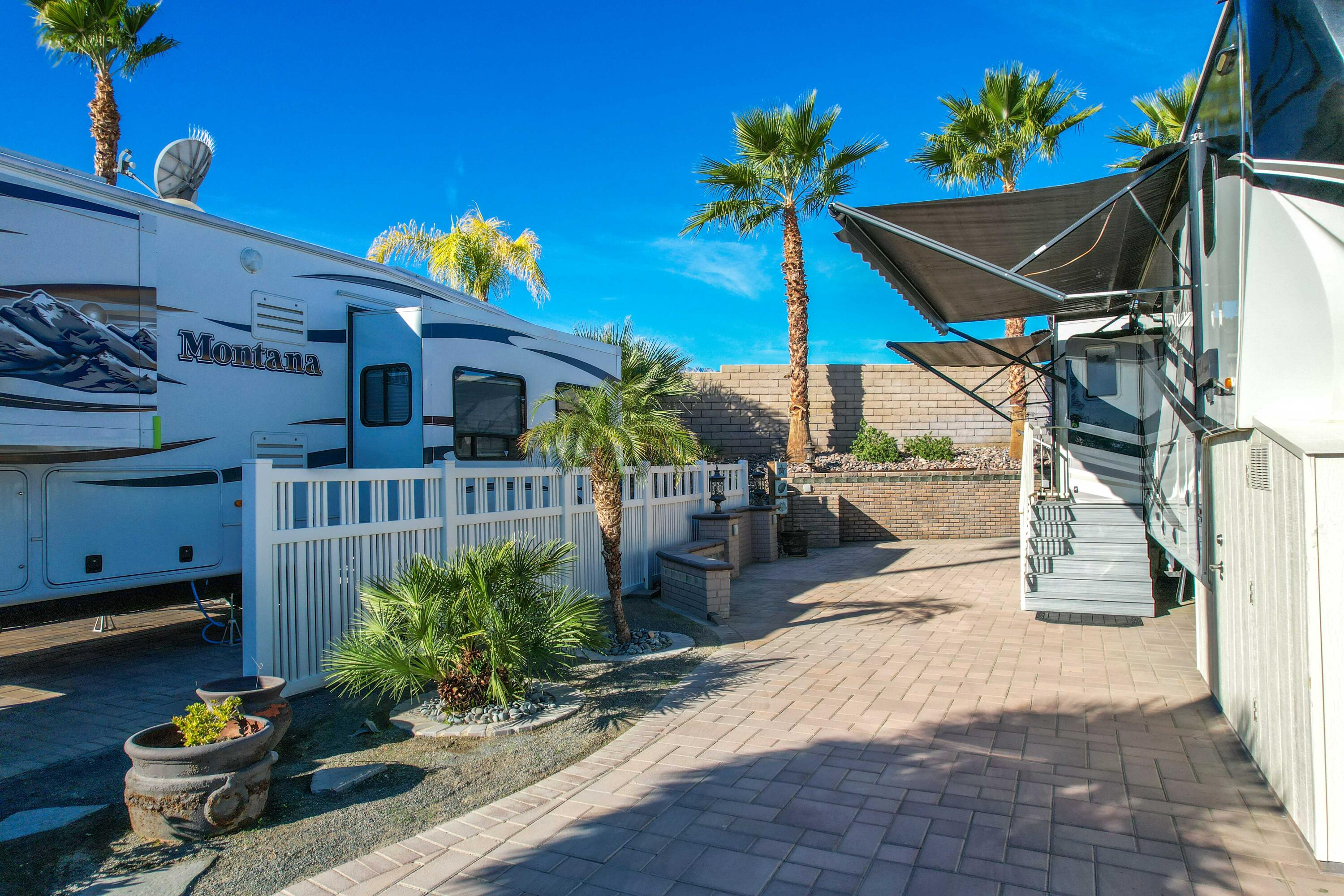 69411 Ramon Road, Unit 131 Cathedral City, CA 92234 - Photo 21 of 65 a view of a chairs and table in the patio