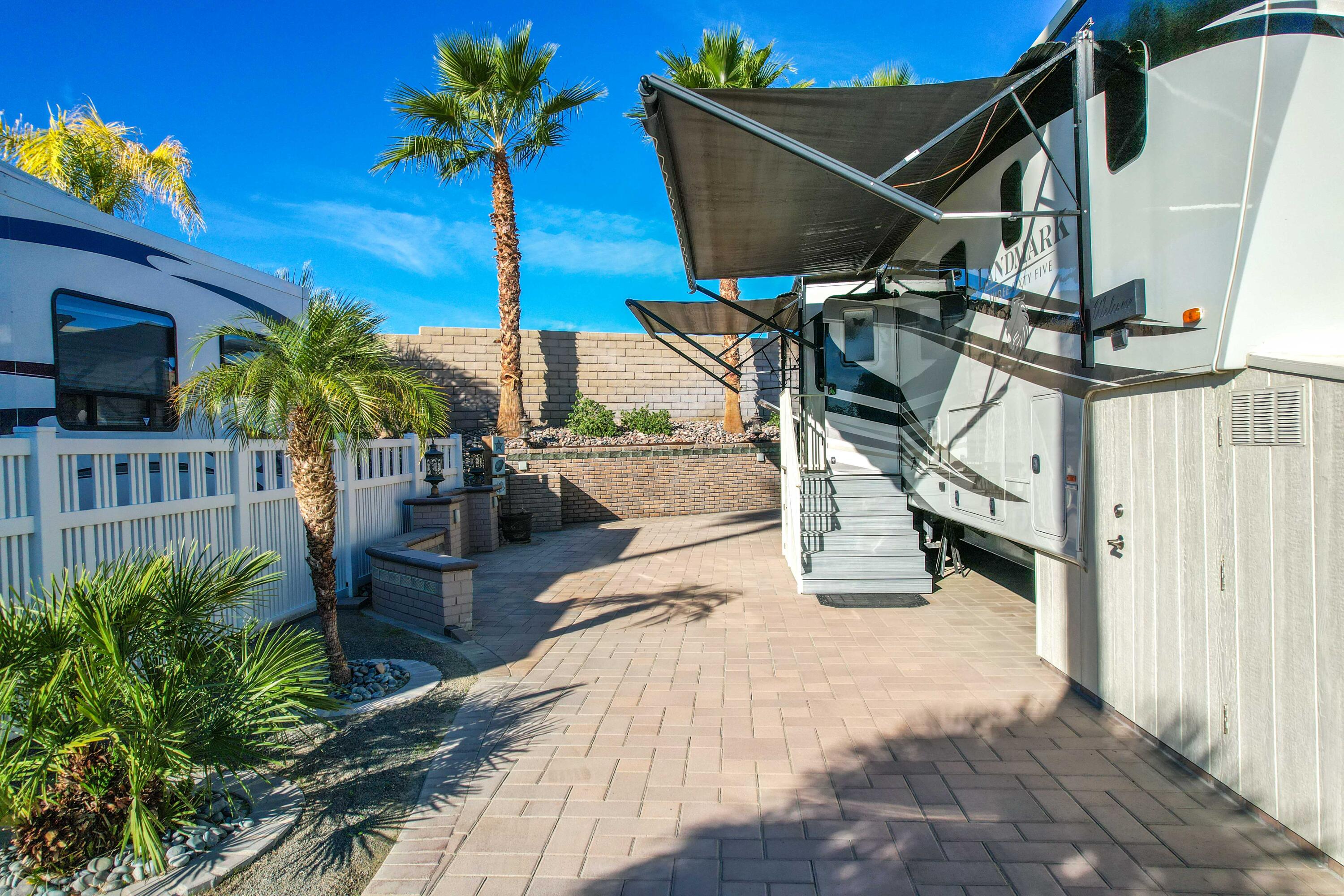 69411 Ramon Road, Unit 131 Cathedral City, CA 92234 - Photo 22 of 65 a view of a porch with potted plants