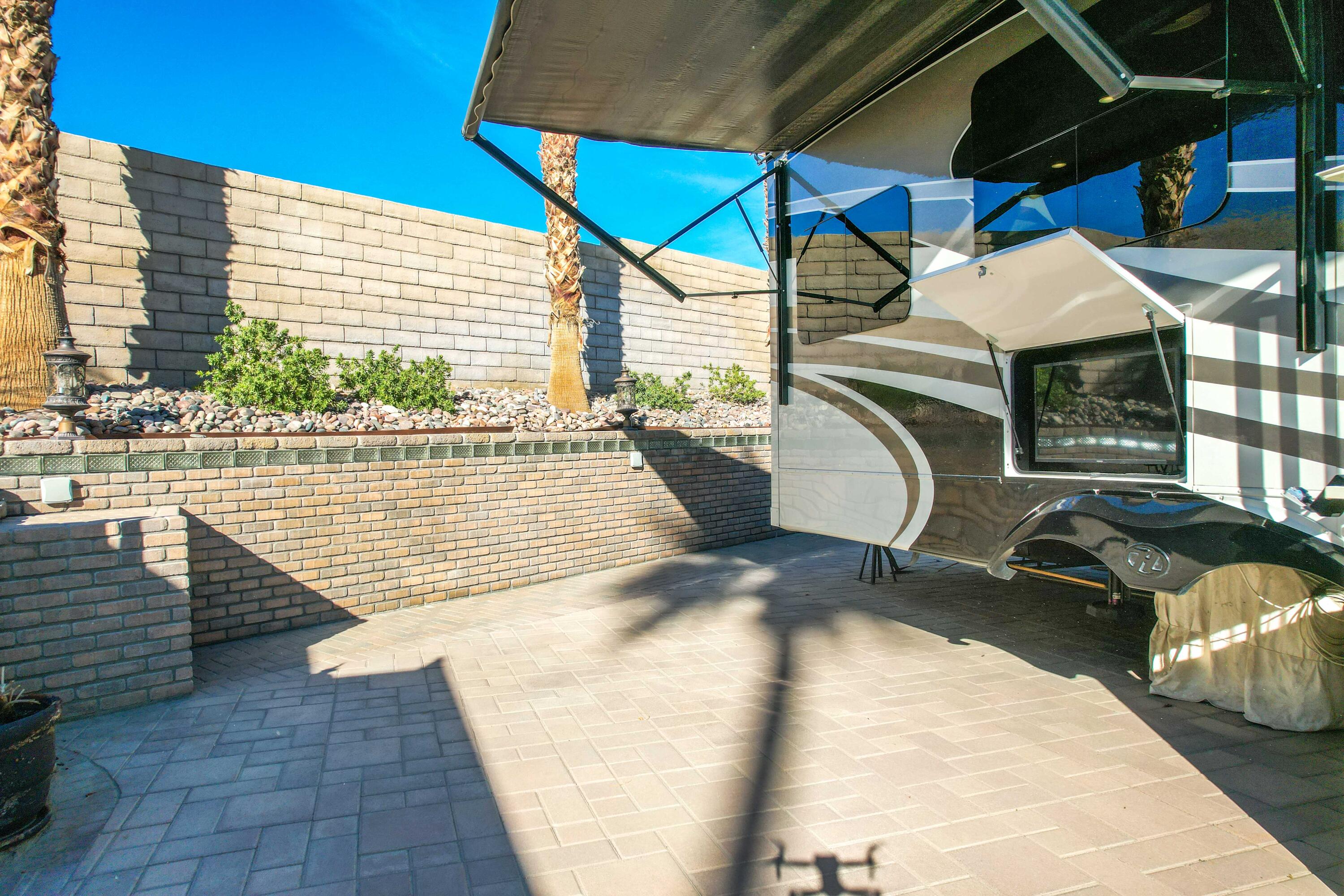 69411 Ramon Road, Unit 131 Cathedral City, CA 92234 - Photo 24 of 65 a view of balcony with couch and wooden floor