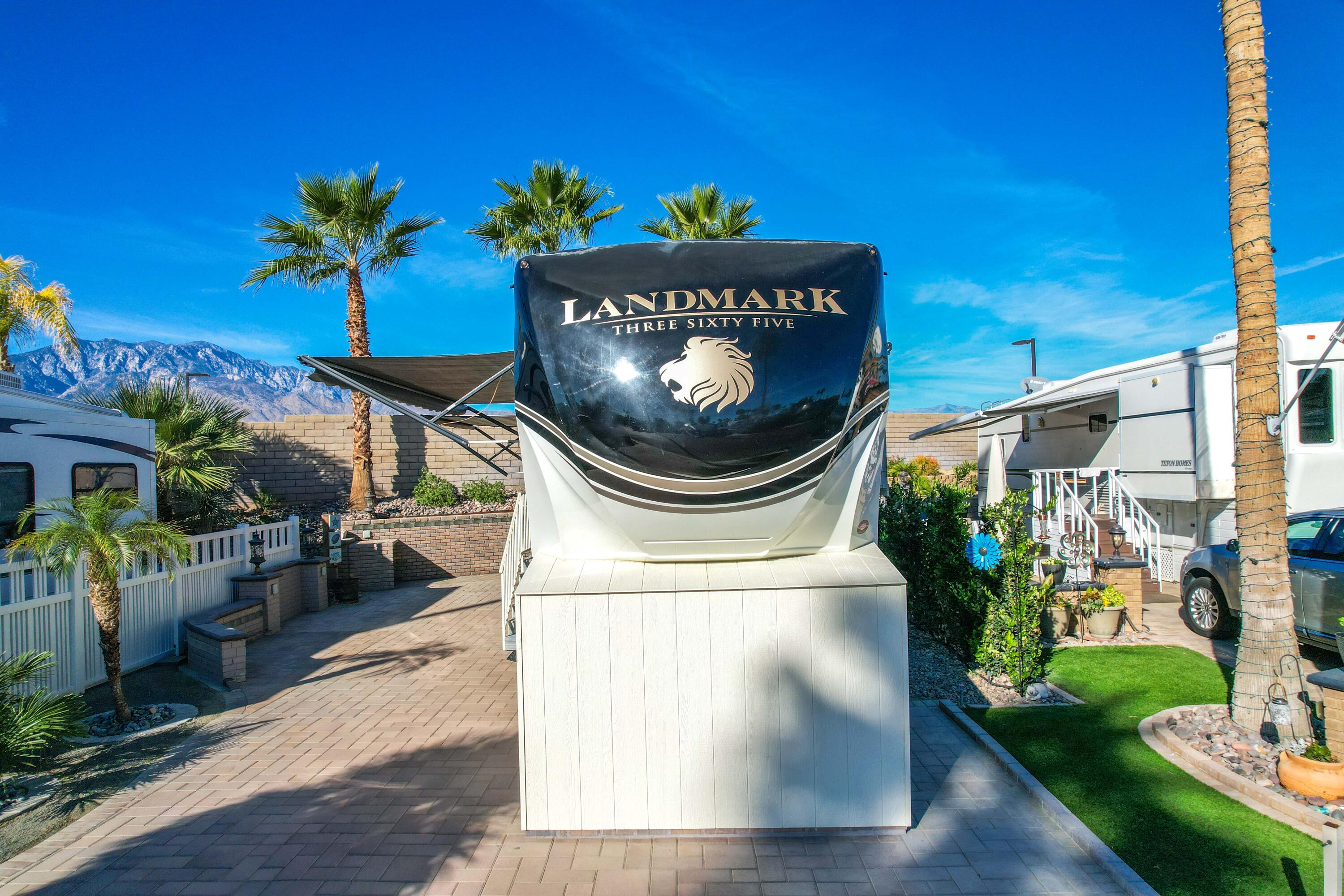 69411 Ramon Road, Unit 131 Cathedral City, CA 92234 - Photo 9 of 65 a view of a house with a fountain in a yard