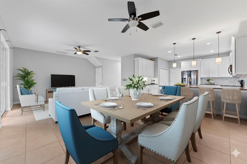 1264 Riserva Lane Palm Harbor, FL 34683 - Photo 2 of 28 a view of a dining room with furniture