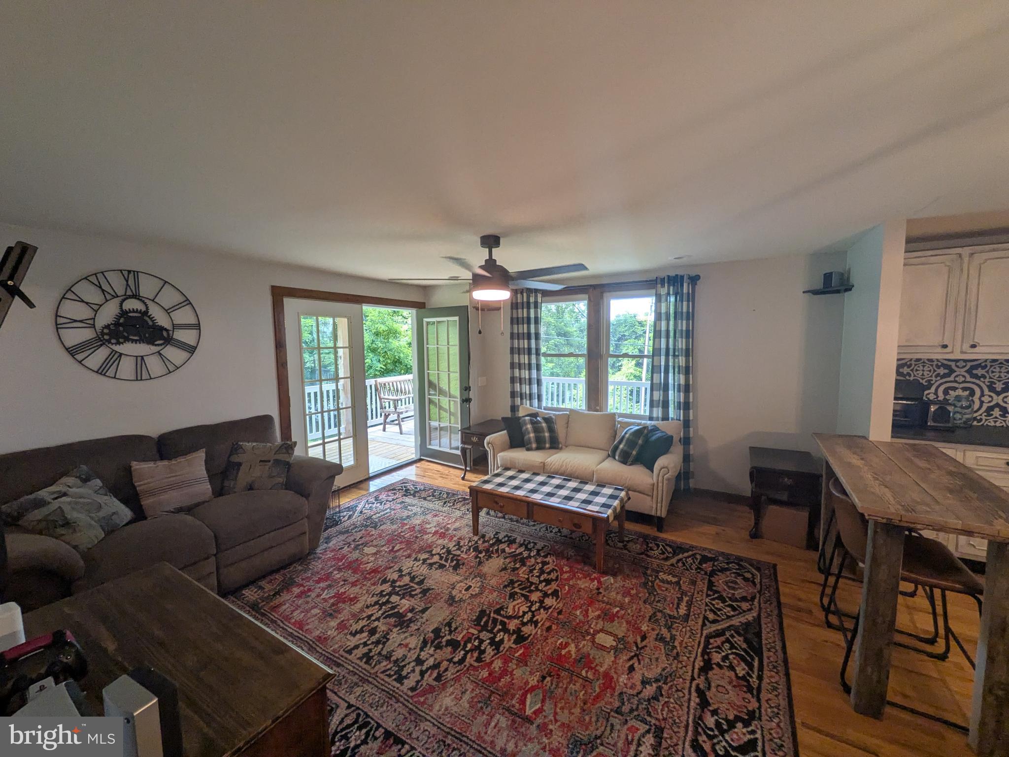2418 Muddy Run Road Mifflintown, PA 17059 - Photo 24 of 44 a living room with furniture rug and window