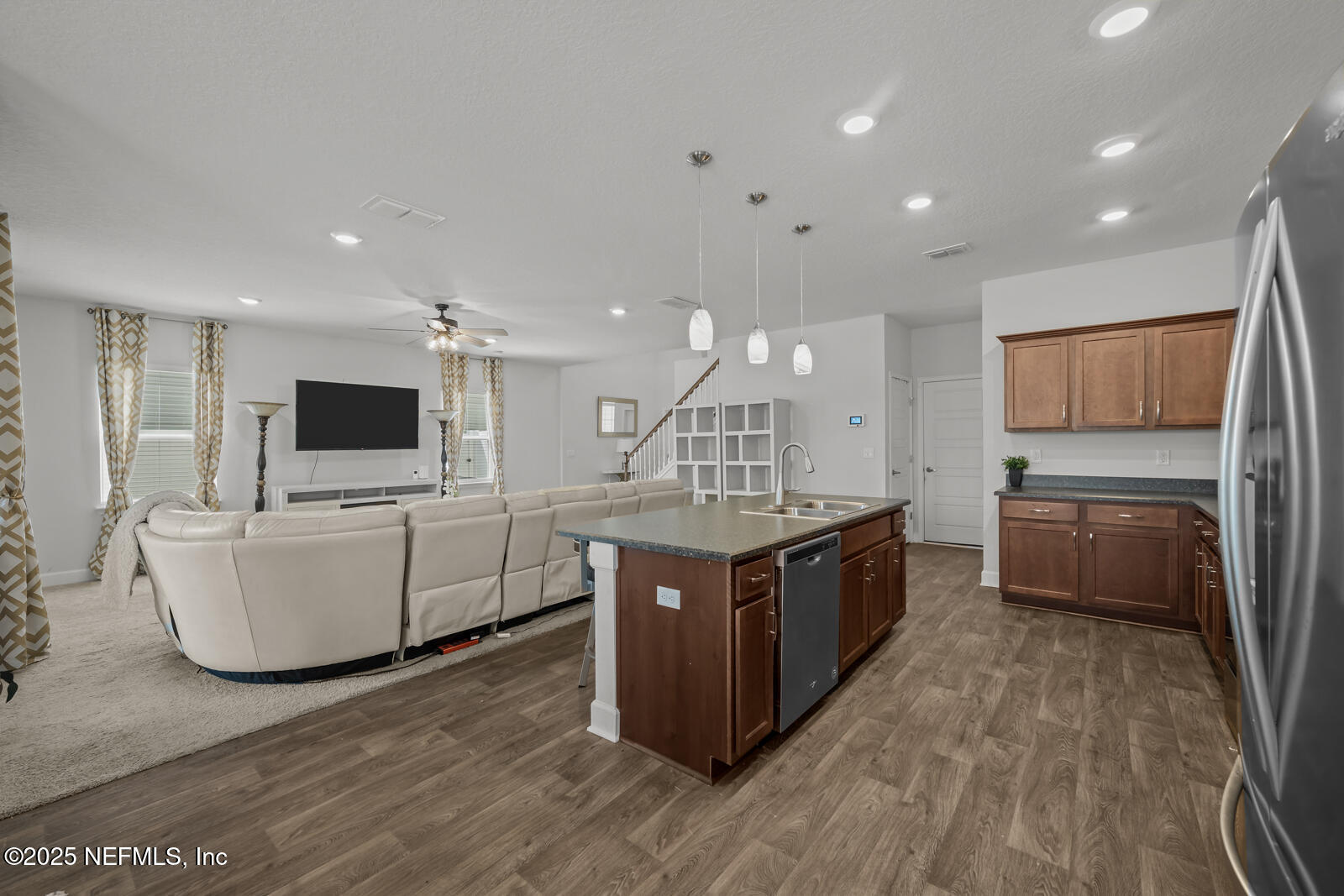 9961 Redfish Marsh Circle Jacksonville, FL 32219 - Photo 13 of 37 a large kitchen with stainless steel appliances a large counter top and a wooden floors