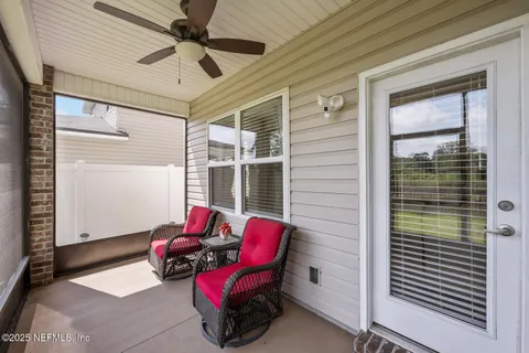 a balcony with furniture and window