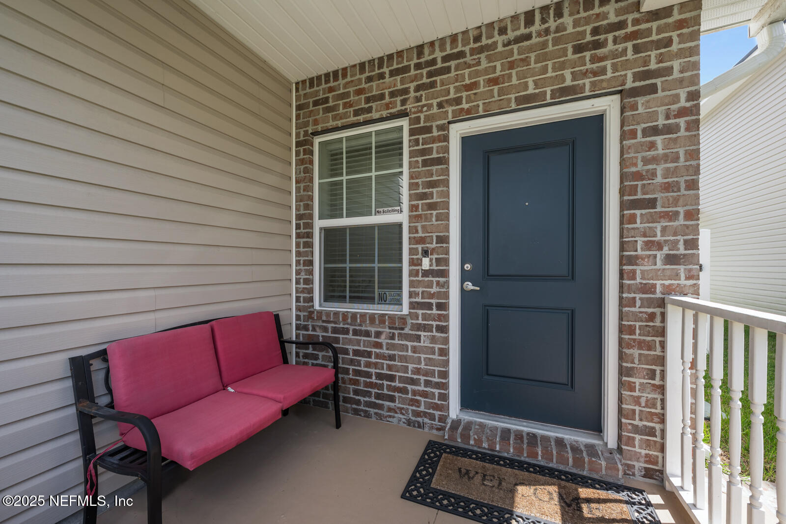 9961 Redfish Marsh Circle Jacksonville, FL 32219 - Photo 3 of 37 a view of a door and a chair in the balcony
