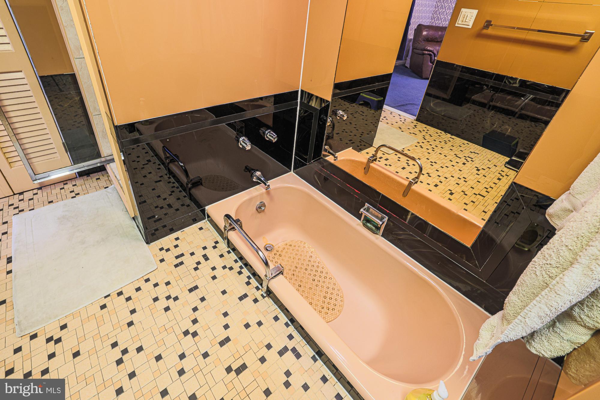 3305 Bancroft Road Baltimore, MD 21215 - Photo 52 of 61 Chic retro bathroom with elegant tiles.