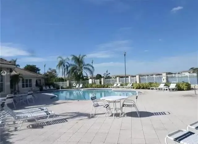 $290,000 | 5045 Wiles Road, Unit 308, Coconut Creek, FL 33073